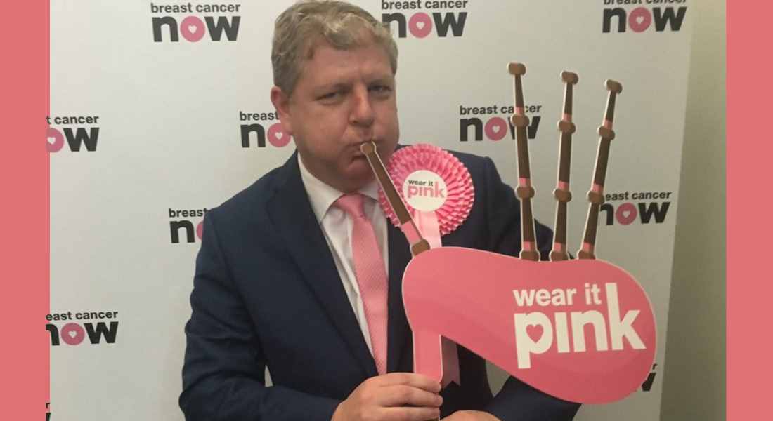 Angus Robertson blows the pipes for Wear it Pink month.