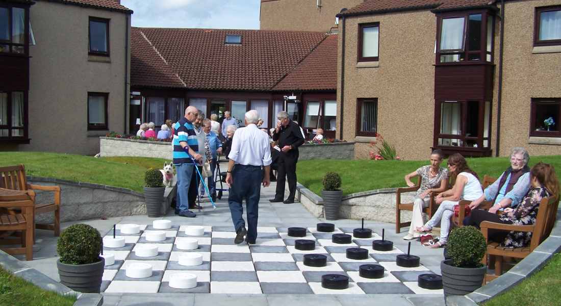 Residents and their guests can now play draughts or go bowling in the new garden.