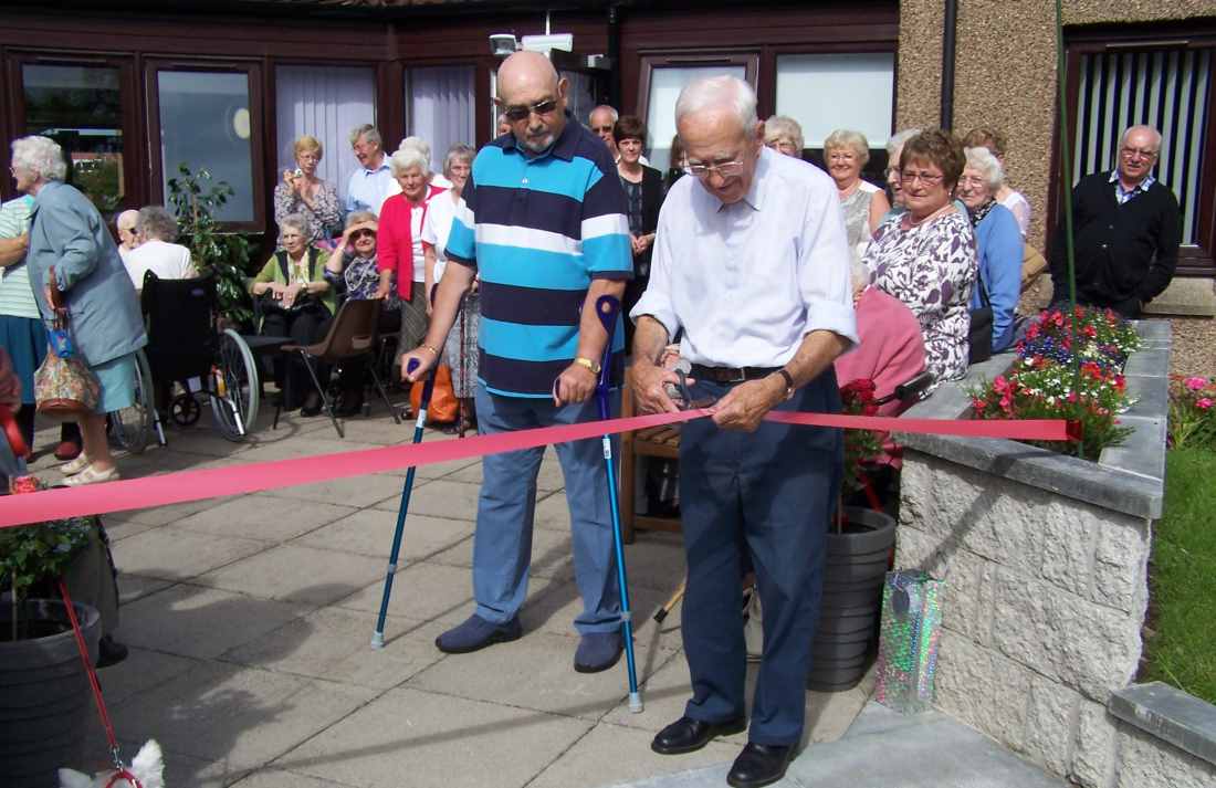 1.Magnus Ingles, one of Burnside Court’s oldest and longest residing residents, cutting the ribbon to open the garden.