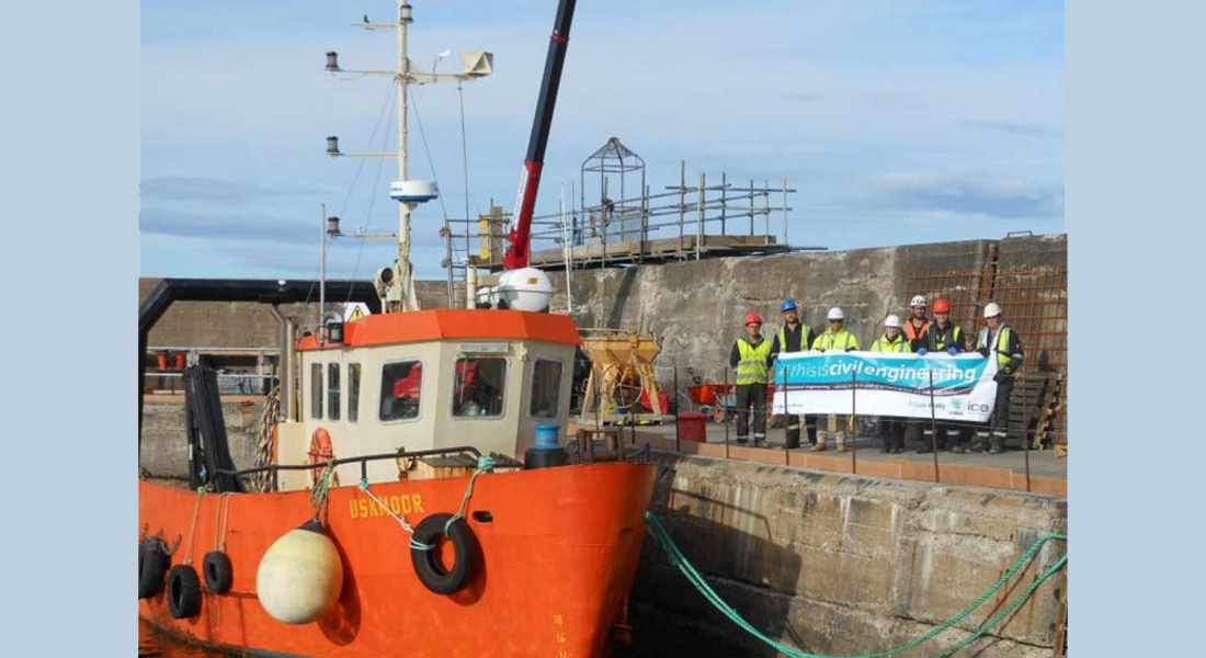 Moray Council, Balfour Beatty and Leask Marine staff   mark completion of Portknockie Harbour repairs.
